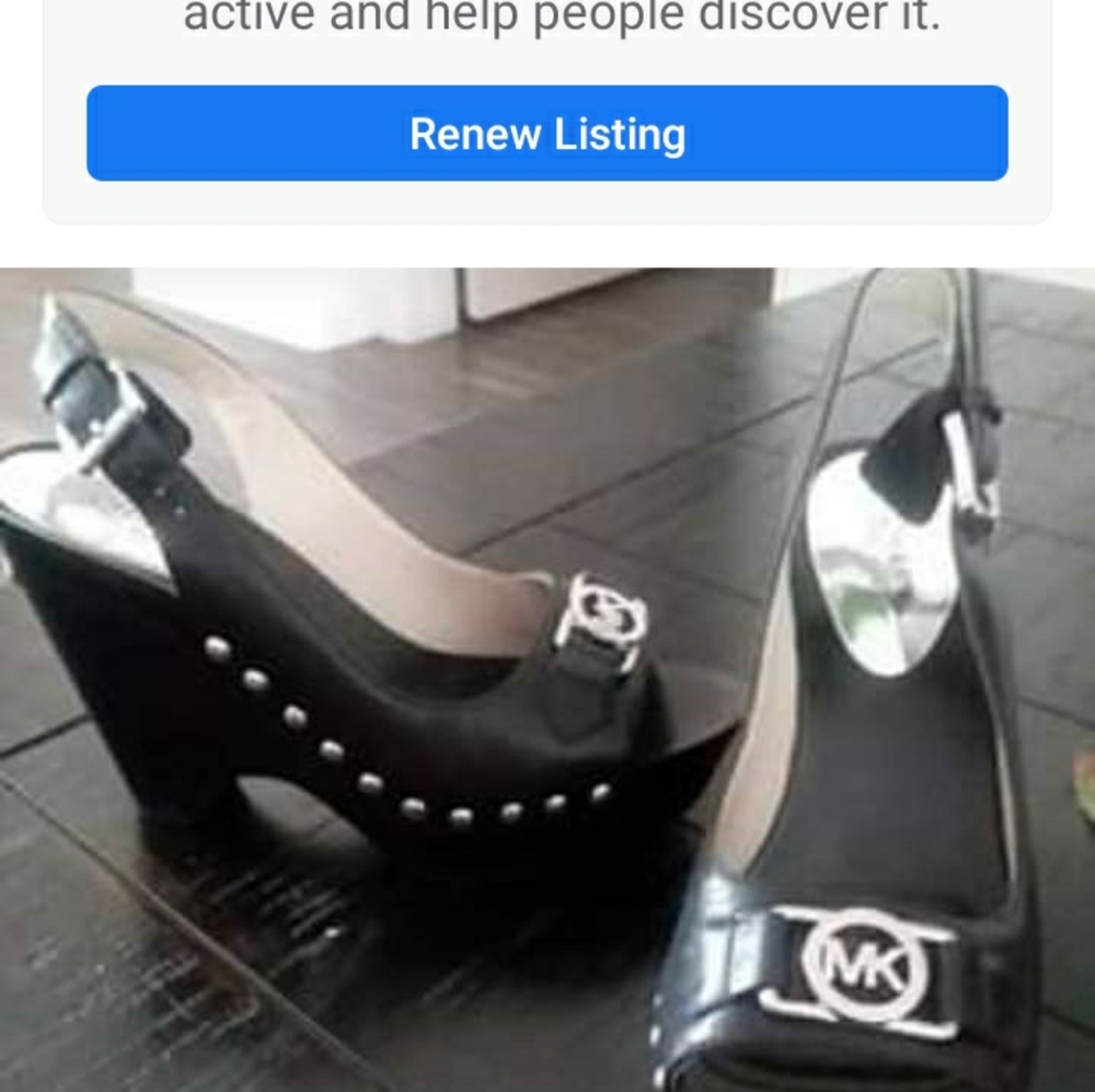 MK black leather wedge